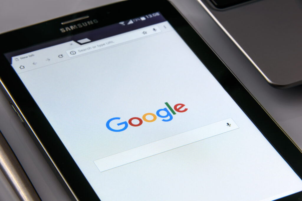 Black samsung tablet display google browser on screen